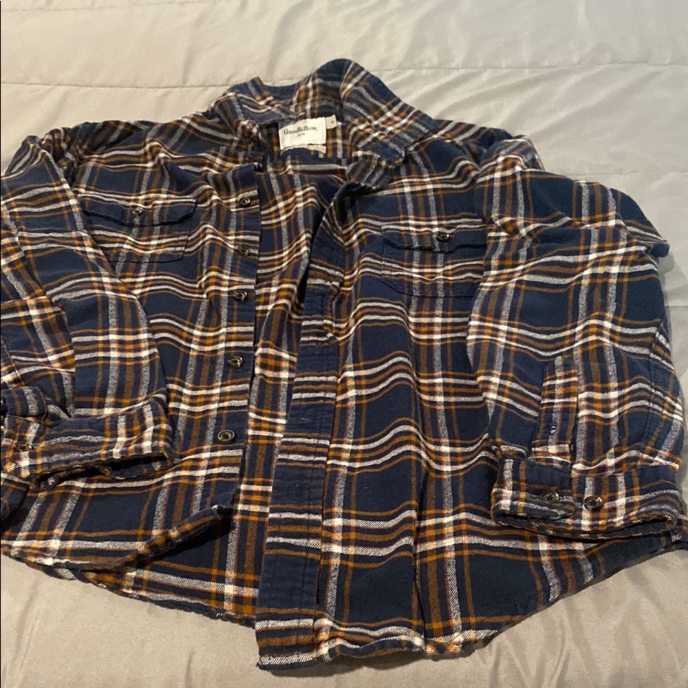 Ladies Flannel. Orange, white and navy blue flannel gently used.